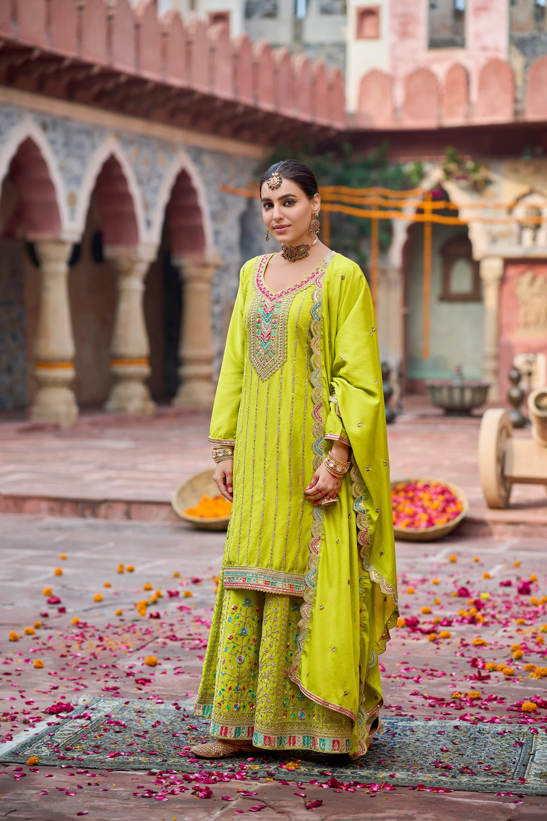 Green Silk Salwar Kameez with Zardozi Embroidery and Mirror Work
