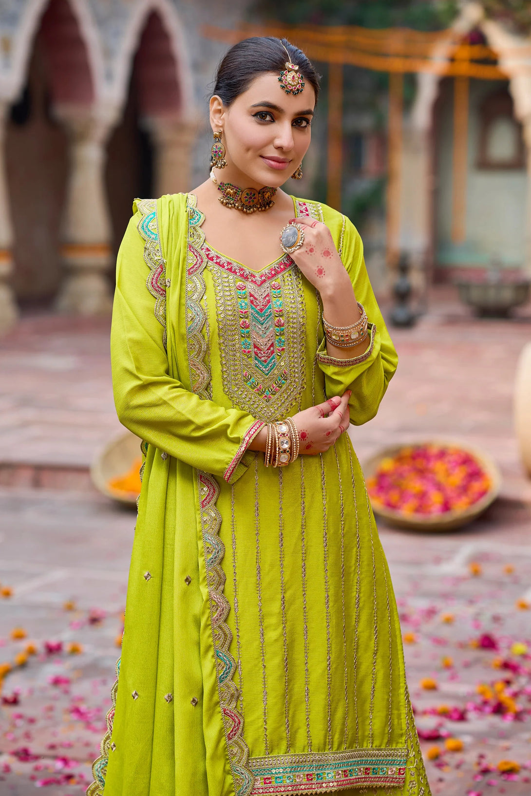 Green Silk Salwar Kameez with Zardozi Embroidery and Mirror Work
