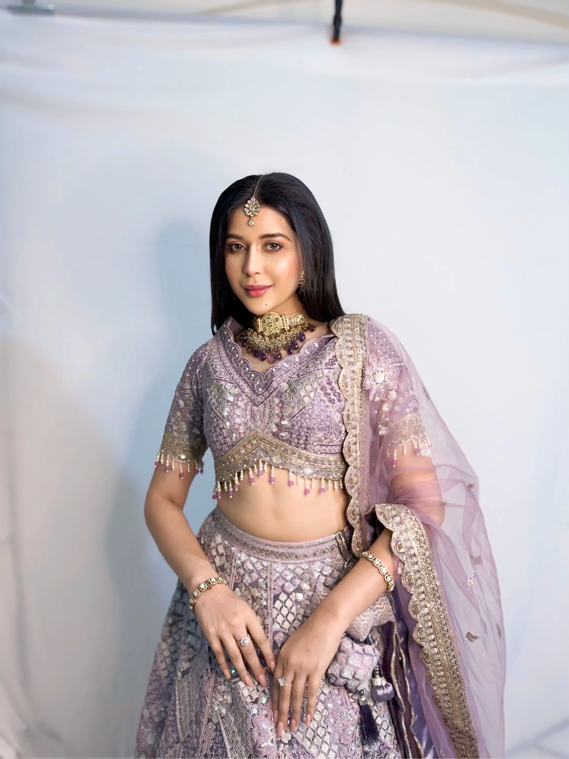 Lavender Silk Lehenga with Floral Embroidery Mirror Stonework and Gold Zari Border Work
