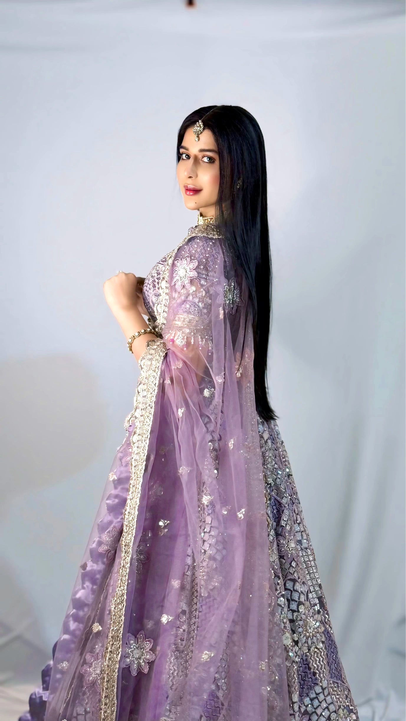 Lavender Silk Lehenga with Floral Embroidery Mirror Stonework and Gold Zari Border Work