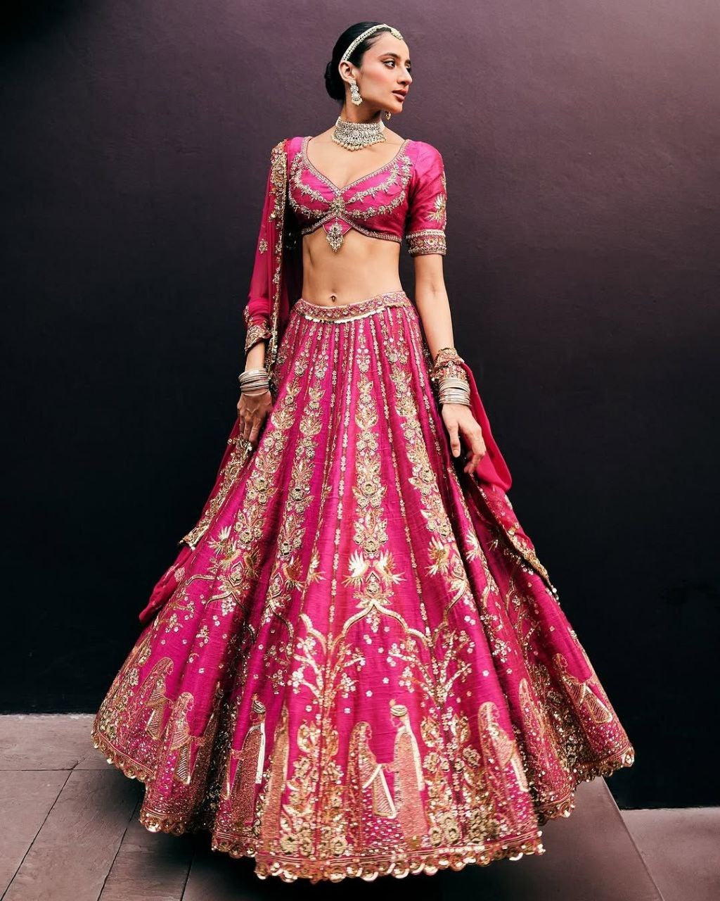 Magenta Pink Bridal Silk Lehenga with Heavy Zari Embroidery, Stone Work, and Royal Motif Design
