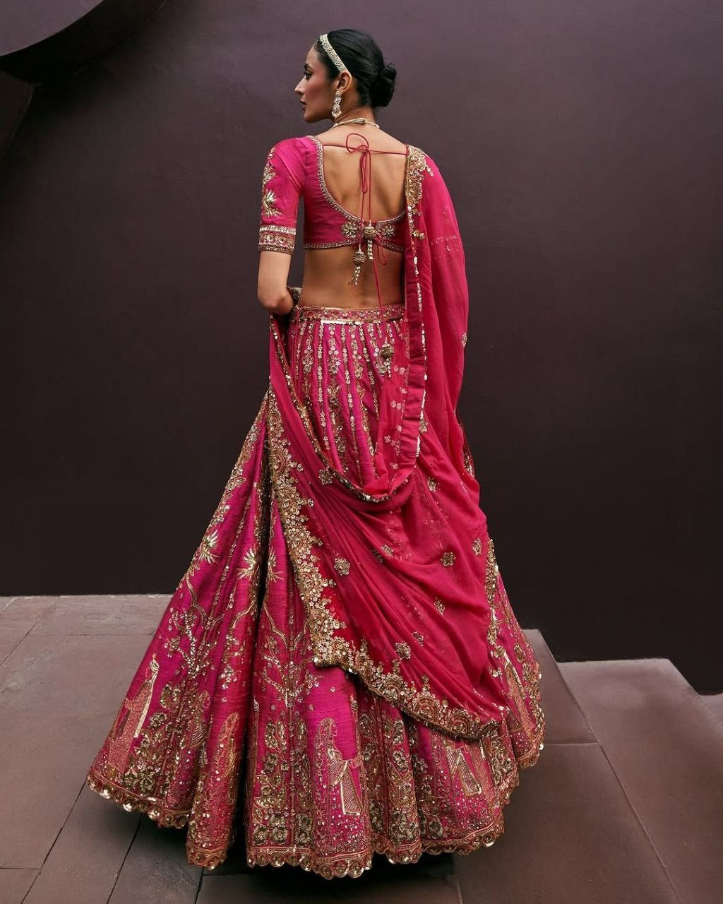 Magenta Pink Bridal Silk Lehenga with Heavy Zari Embroidery, Stone Work, and Royal Motif Design
