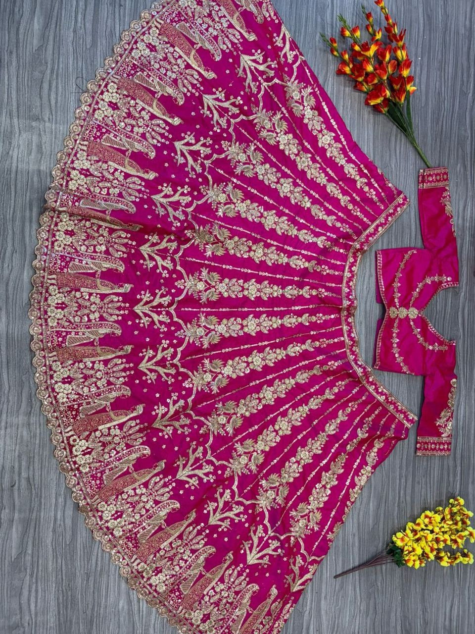 Magenta Pink Bridal Silk Lehenga with Heavy Zari Embroidery, Stone Work, and Royal Motif Design
