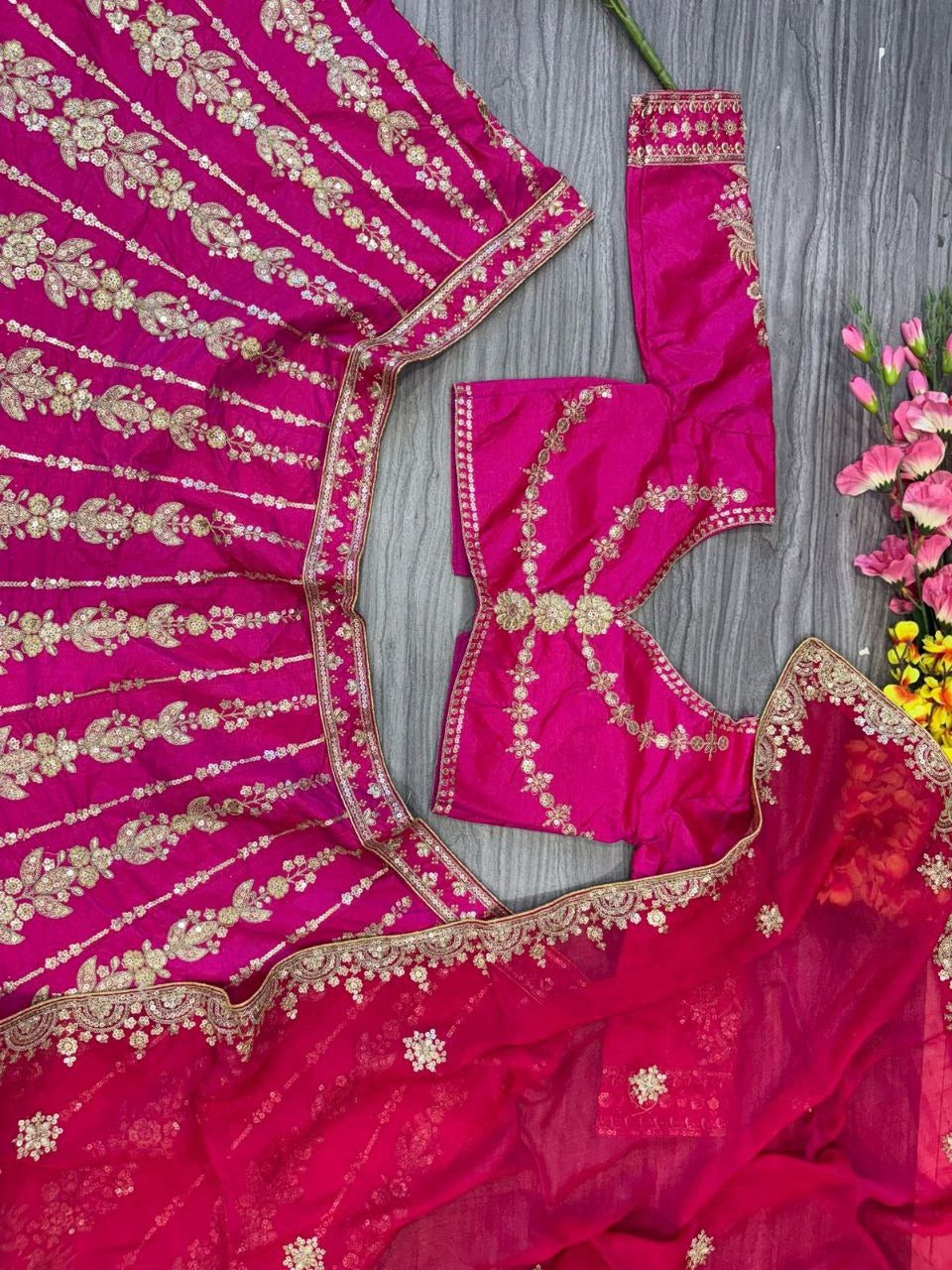 Magenta Pink Bridal Silk Lehenga with Heavy Zari Embroidery, Stone Work, and Royal Motif Design
