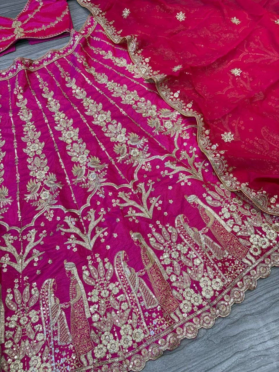 Magenta Pink Bridal Silk Lehenga with Heavy Zari Embroidery, Stone Work, and Royal Motif Design
