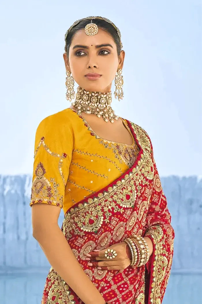 Red Bandhani Georgette Saree with Intricate Zari Embroidery & Yellow Embroidered Blouse
