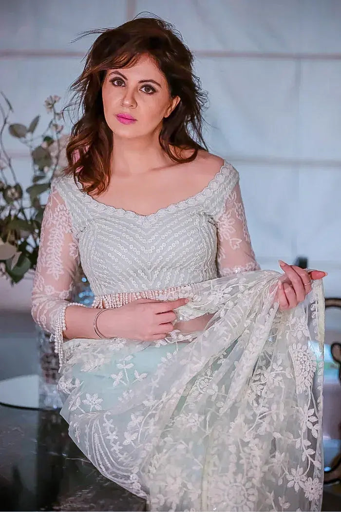 Mint Green and White Net Saree with Floral Stone Work Heavy Sequin Embroidery and a Matching Full Sleeves Blouse