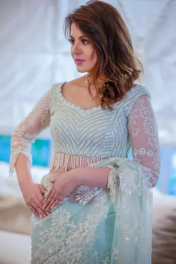 Mint Green and White Net Saree with Floral Stone Work Heavy Sequin Embroidery and a Matching Full Sleeves Blouse