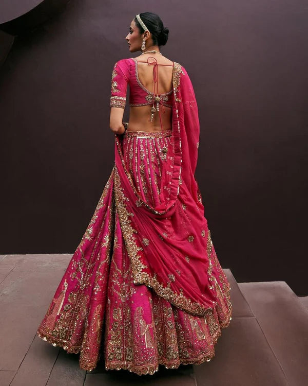 Magenta Pink Bridal Silk Lehenga with Heavy Zari Embroidery, Stone Work, and Royal Motif Design