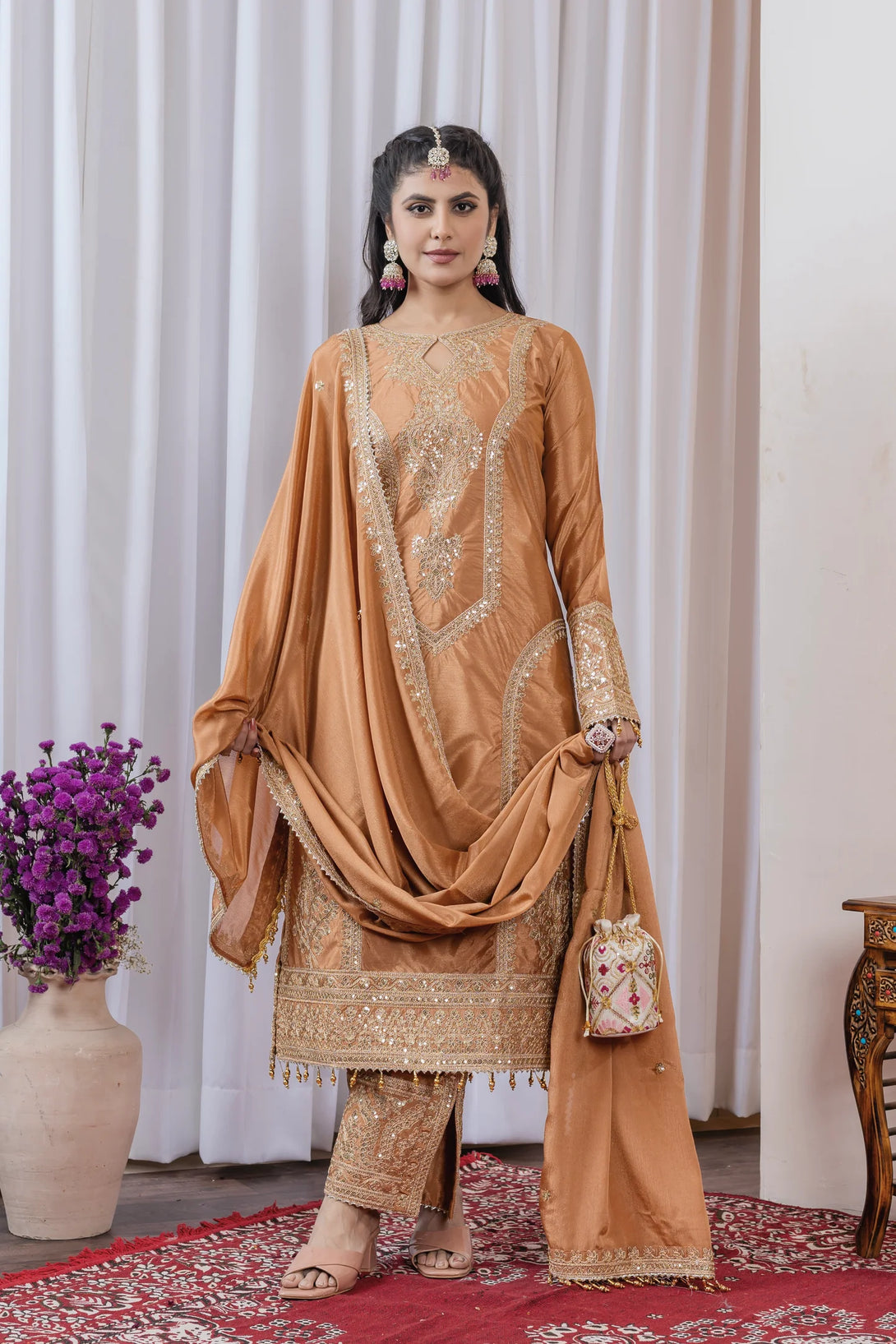 Orange Silk Salwar Kameez showcasing Embroidery and Motifs with Coding Dori Work

