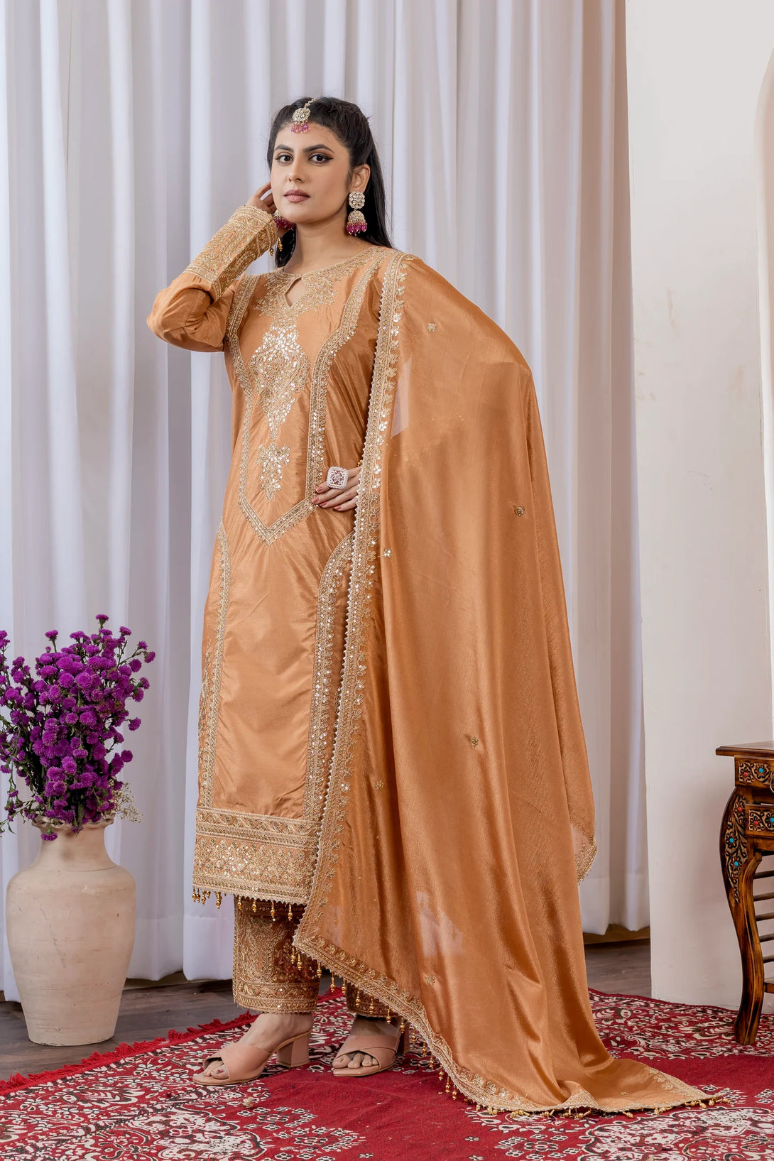 Orange Silk Salwar Kameez showcasing Embroidery and Motifs with Coding Dori Work
