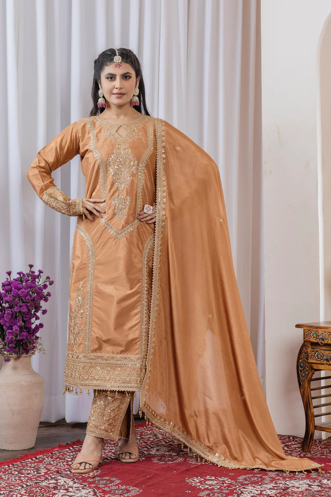 Orange Silk Salwar Kameez showcasing Embroidery and Motifs with Coding Dori Work

