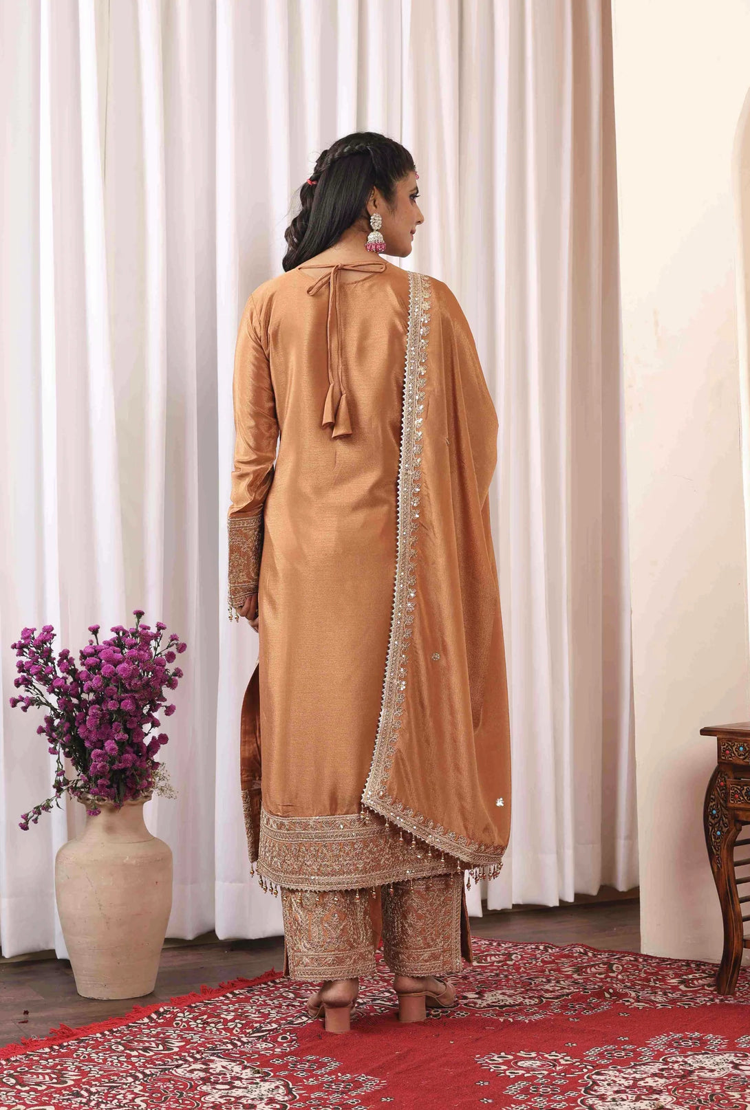 Orange Silk Salwar Kameez showcasing Embroidery and Motifs with Coding Dori Work
