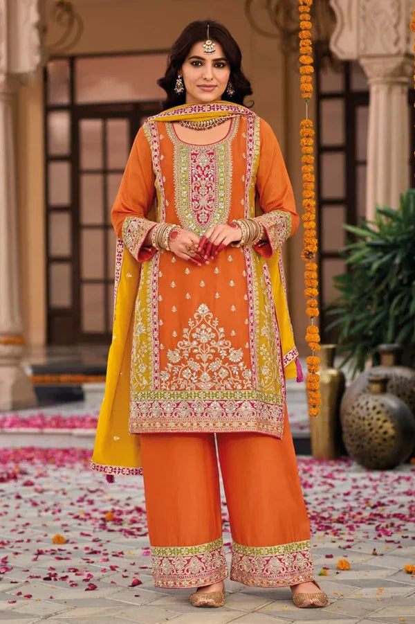 Orange Silk Salwar Kameez with Embroidery and Ornate Patterns
