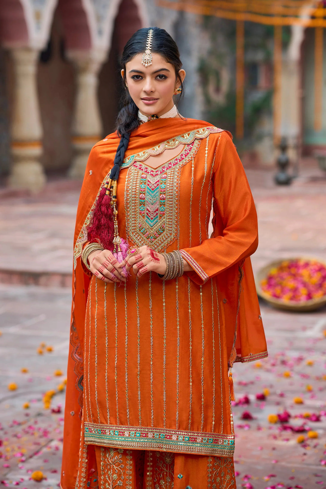 Orange Silk Salwar Kameez with Zardozi Embroidery and Mirror Work

