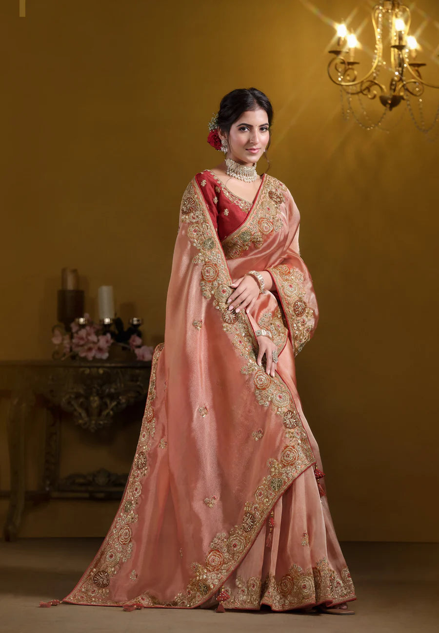 Orange Silk Saree with Embroidery Borders and Pallu Designs 