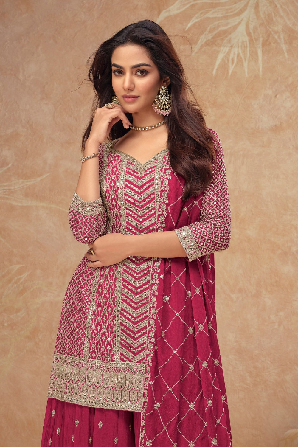Pink Georgette Salwar Kameez featuring Chevron Pattern with Sequin and Motif Design
