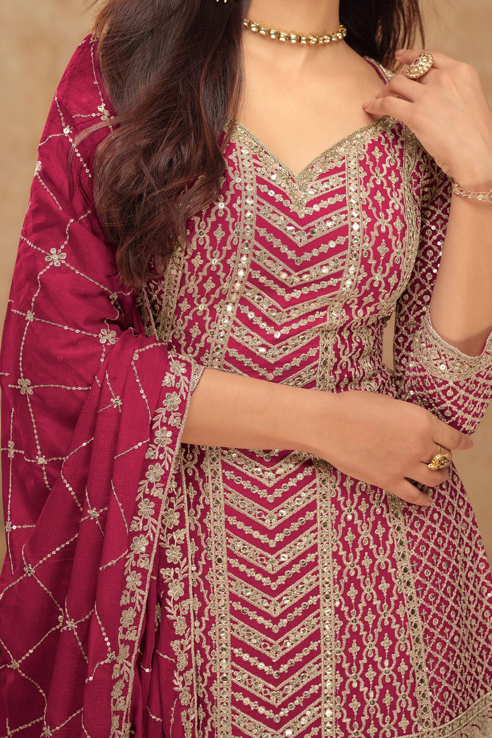 Pink Georgette Salwar Kameez featuring Chevron Pattern with Sequin and Motif Design

