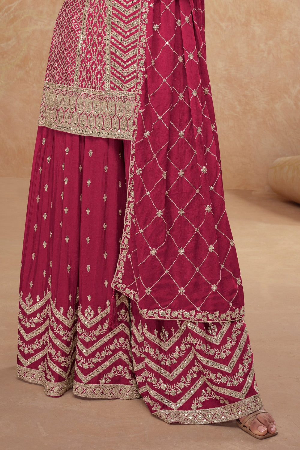 Pink Georgette Salwar Kameez featuring Chevron Pattern with Sequin and Motif Design

