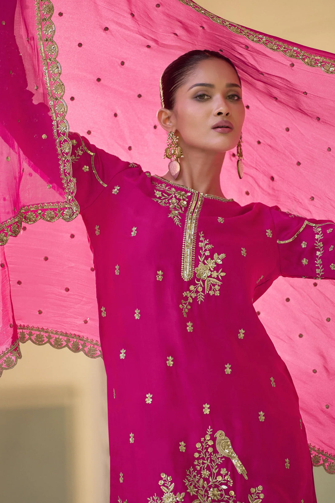 Pink Silk Salwar Kameez featuring Avian Jaal Design with Embroidered Silk enhanced by mirror and thread detailing
