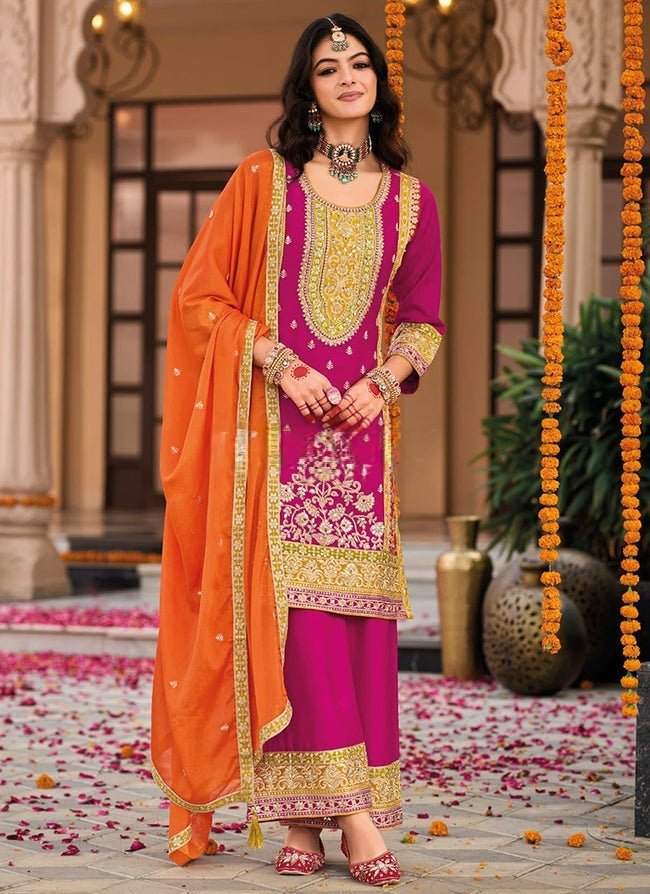 Pink Silk Salwar Kameez with Embroidery and Ornate Patterns
