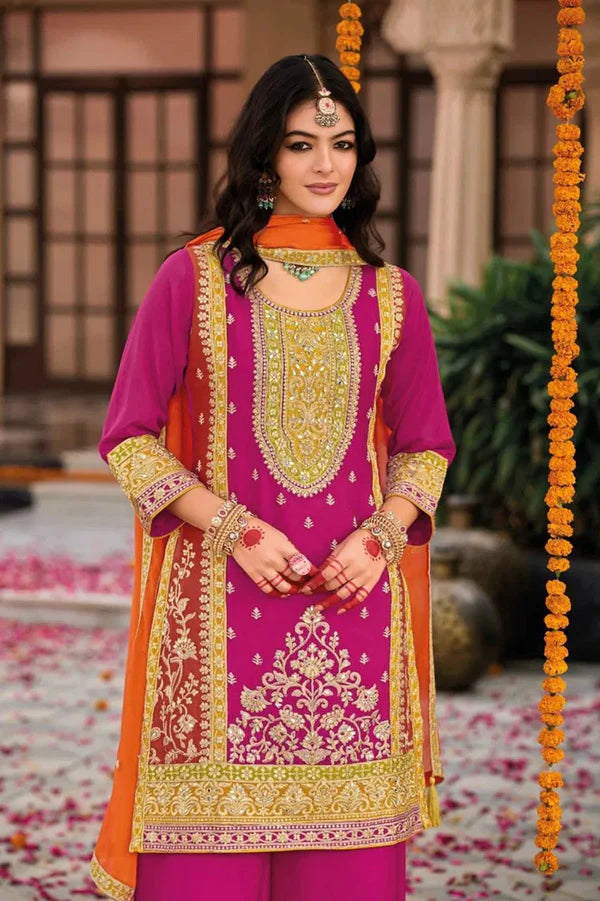 Pink Silk Salwar Kameez with Embroidery and Ornate Patterns
