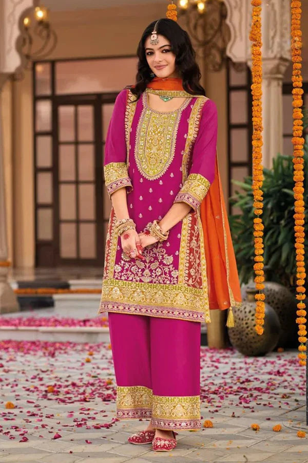 Pink Silk Salwar Kameez with Embroidery and Ornate Patterns
