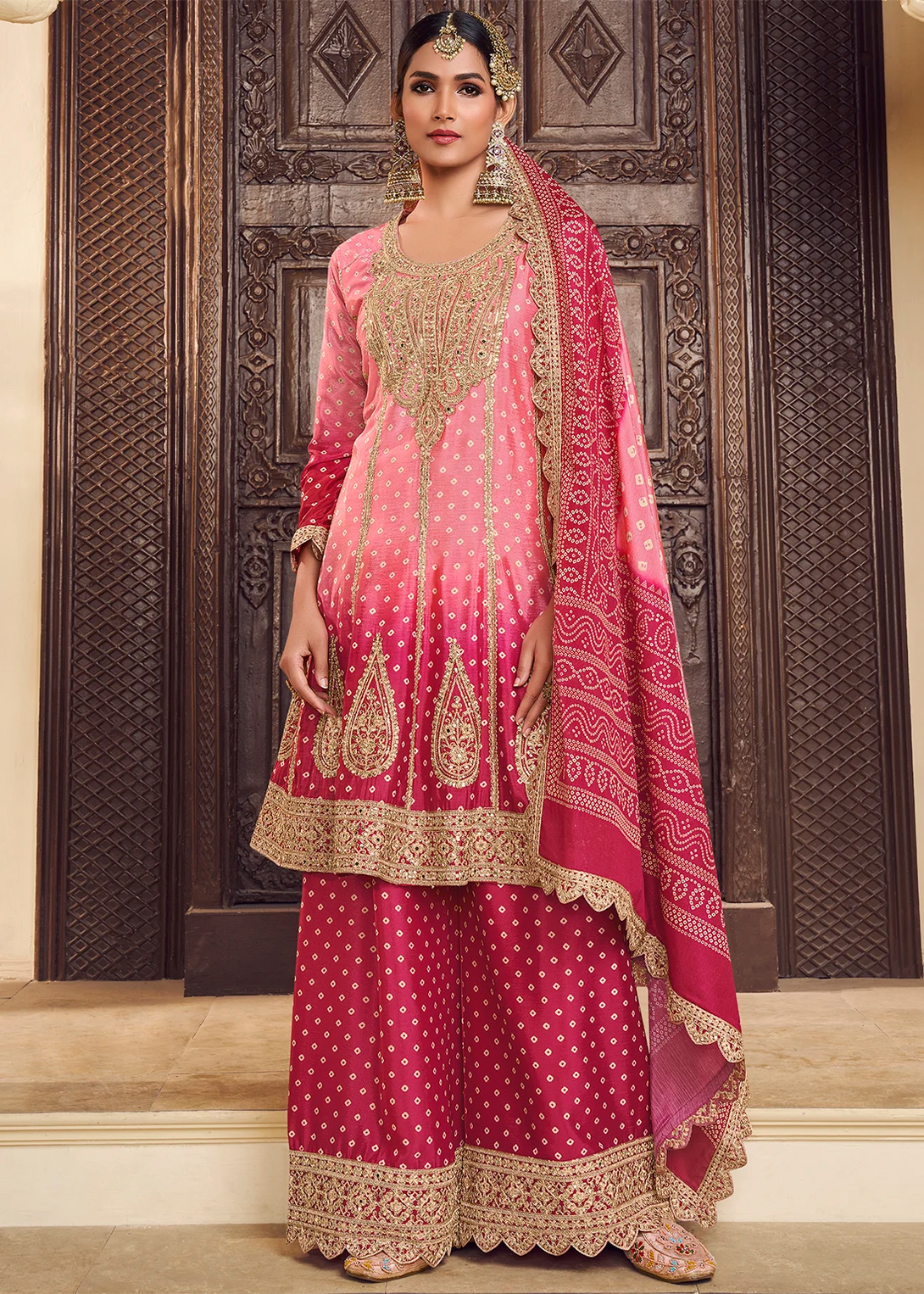 Pink Silk Salwar Kameez with Intricate Motifs Design and Heavy golden thread embroidery Work
