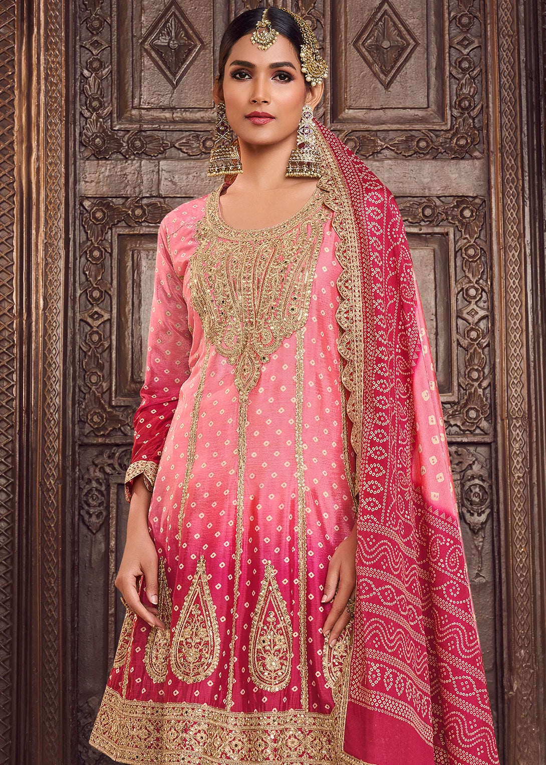 Pink Silk Salwar Kameez with Intricate Motifs Design and Heavy golden thread embroidery Work
