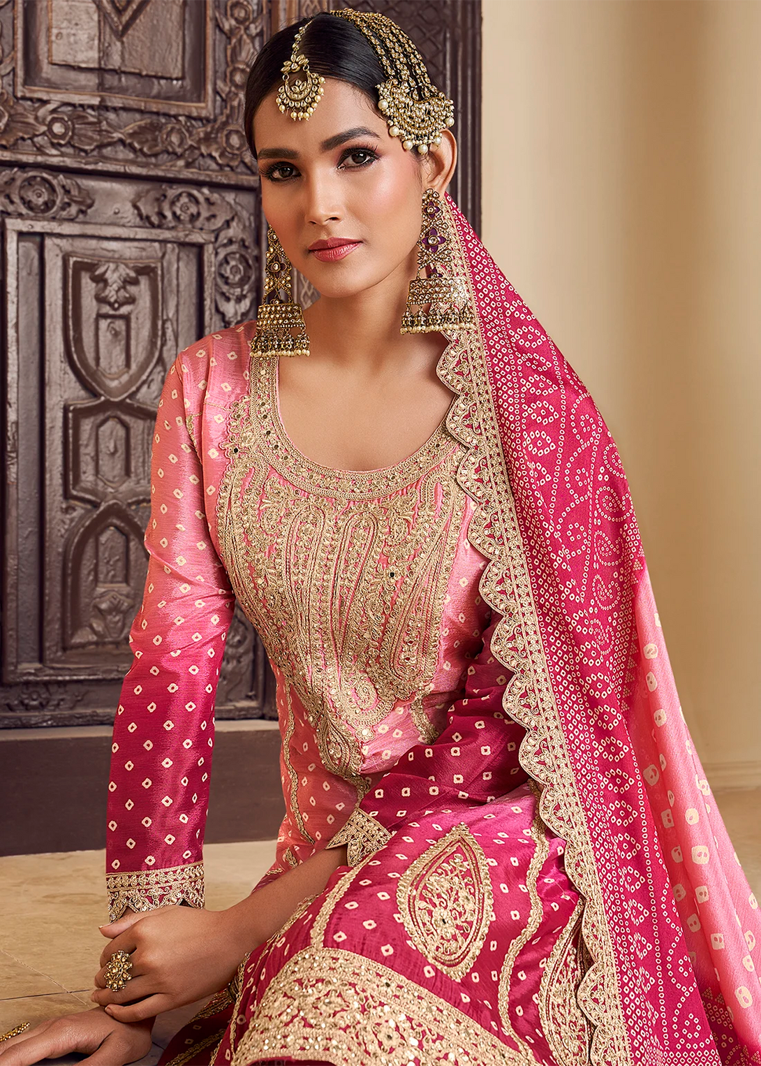 Pink Silk Salwar Kameez with Intricate Motifs Design and Heavy golden thread embroidery Work
