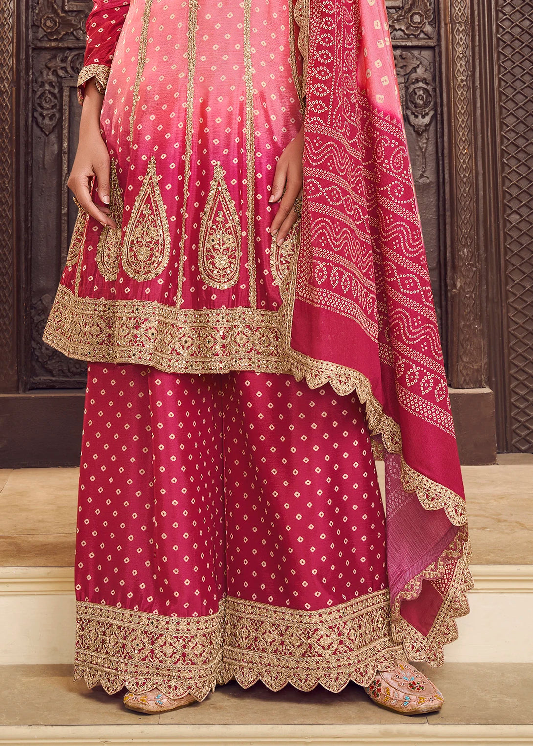 Pink Silk Salwar Kameez with Intricate Motifs Design and Heavy golden thread embroidery Work
