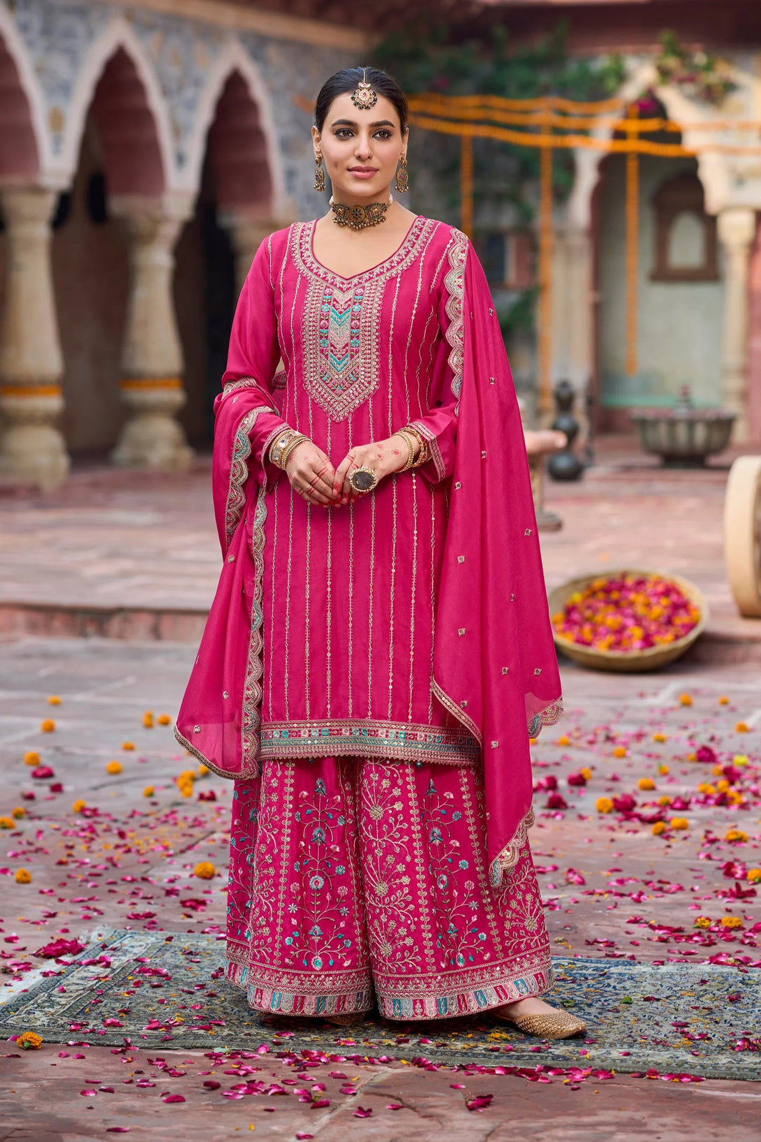 Pink Silk Salwar Kameez with Zardozi Embroidery and Mirror Work
