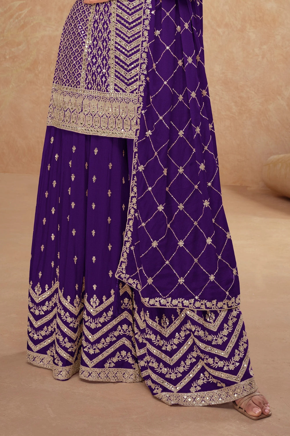 Purple Georgette Salwar Kameez featuring Chevron Pattern with Sequin and Motif Design
