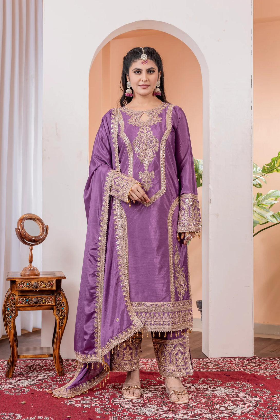 Purple Silk Salwar Kameez showcasing Embroidery and Motifs with Coding Dori Work
