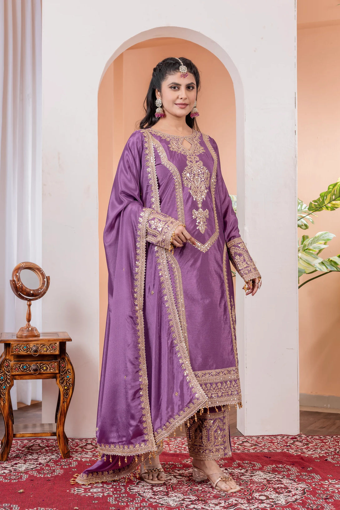 Purple Silk Salwar Kameez showcasing Embroidery and Motifs with Coding Dori Work
