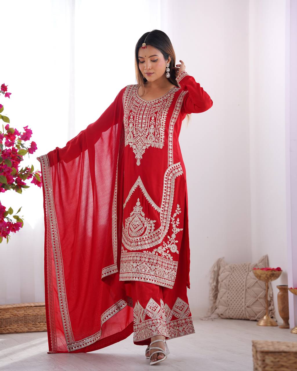 Red Silk Salwar Kameez with Intricate Embroidery and Thread Work
