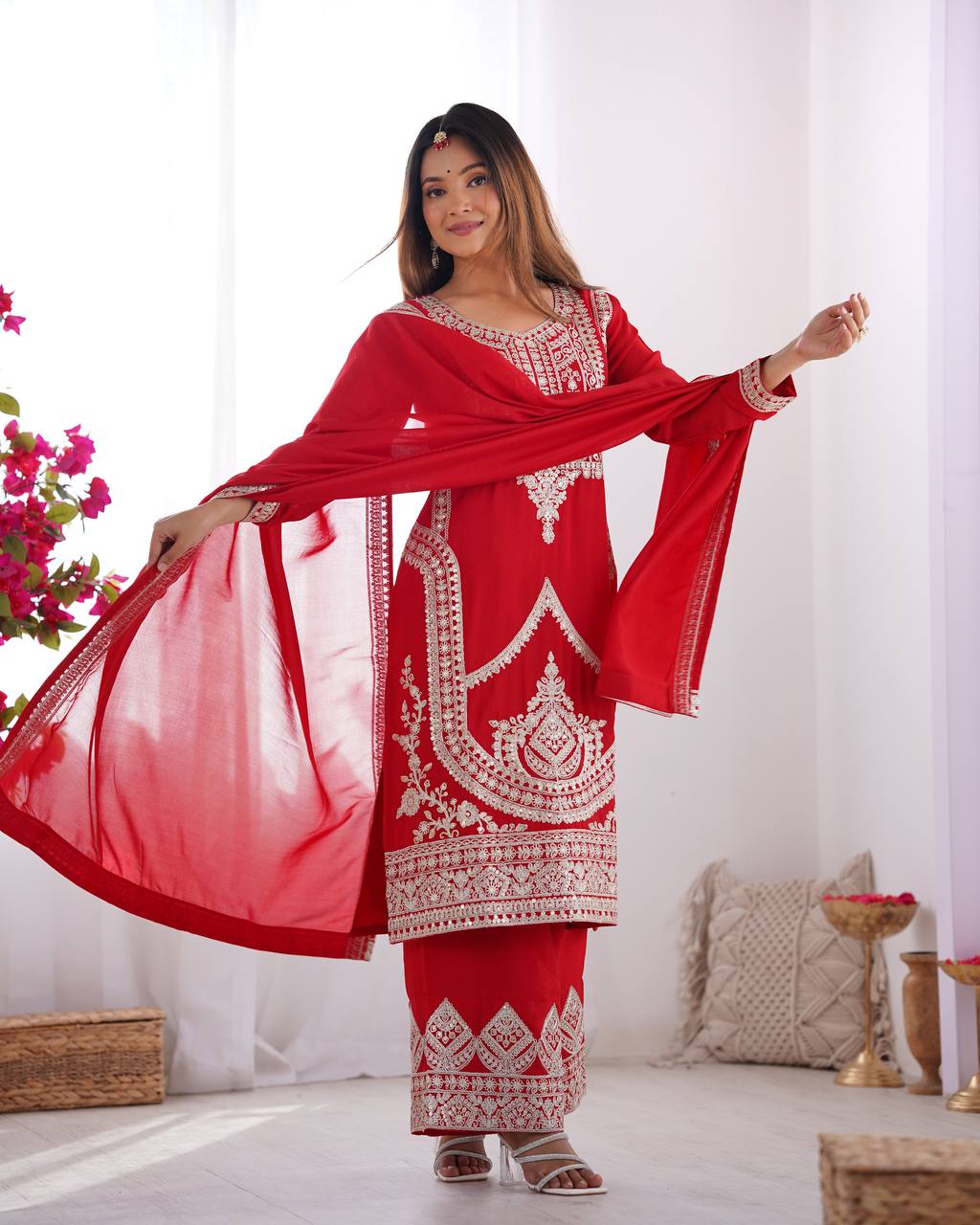 Red Silk Salwar Kameez with Intricate Embroidery and Thread Work
