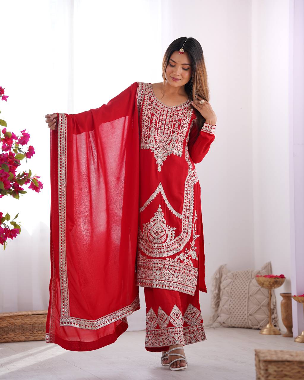 Red Silk Salwar Kameez with Intricate Embroidery and Thread Work
