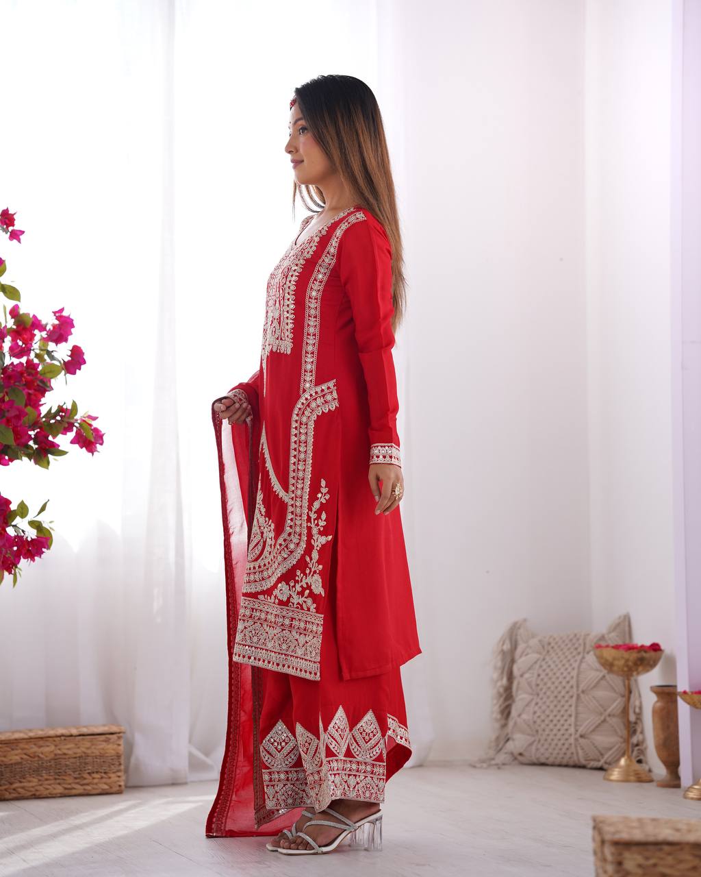 Red Silk Salwar Kameez with Intricate Embroidery and Thread Work
