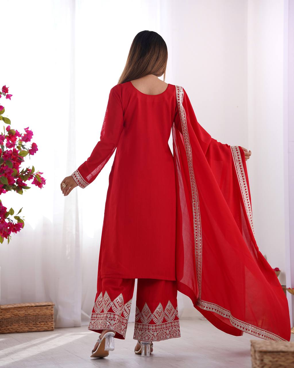 Red Silk Salwar Kameez with Intricate Embroidery and Thread Work
