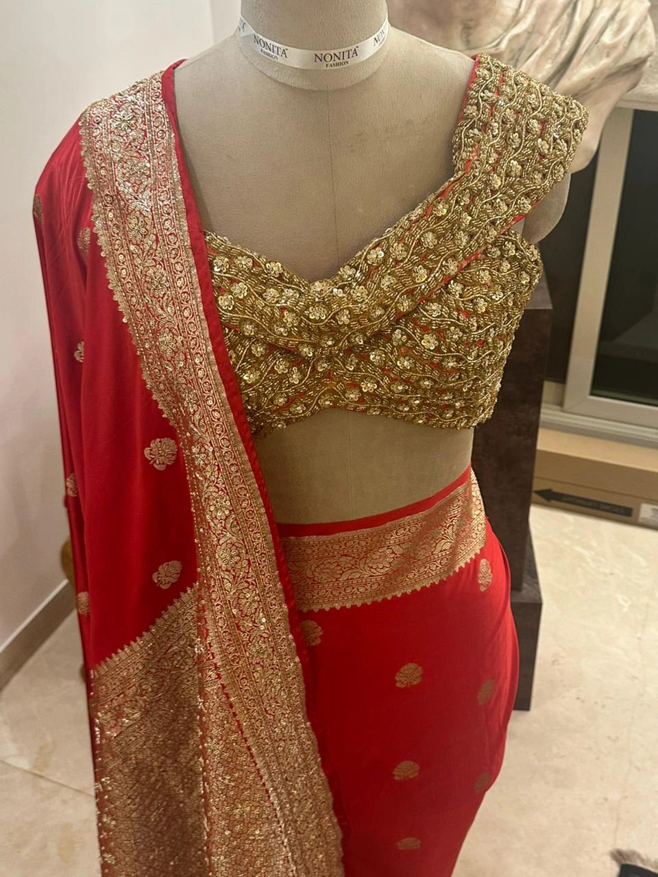 Red Pure Banarasi Silk Saree with All-Over Floral Design and Hand-Embroidered Mirror and Zardosi Blouse