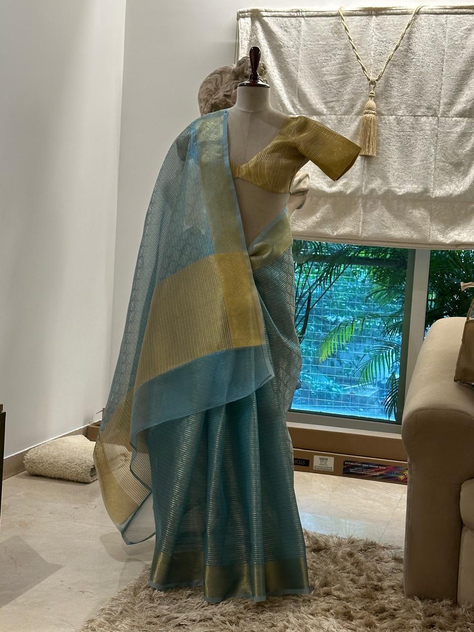 Blue Banarasi Organza Silk Saree with Dual Tone Dotted Checks Pattern and Leaf Design Gold Zari Border