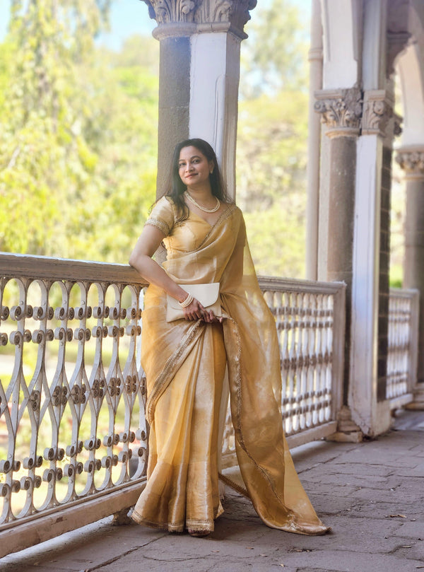 Yellow Shimmer Tissue Saree with Zari and Sequin border work
