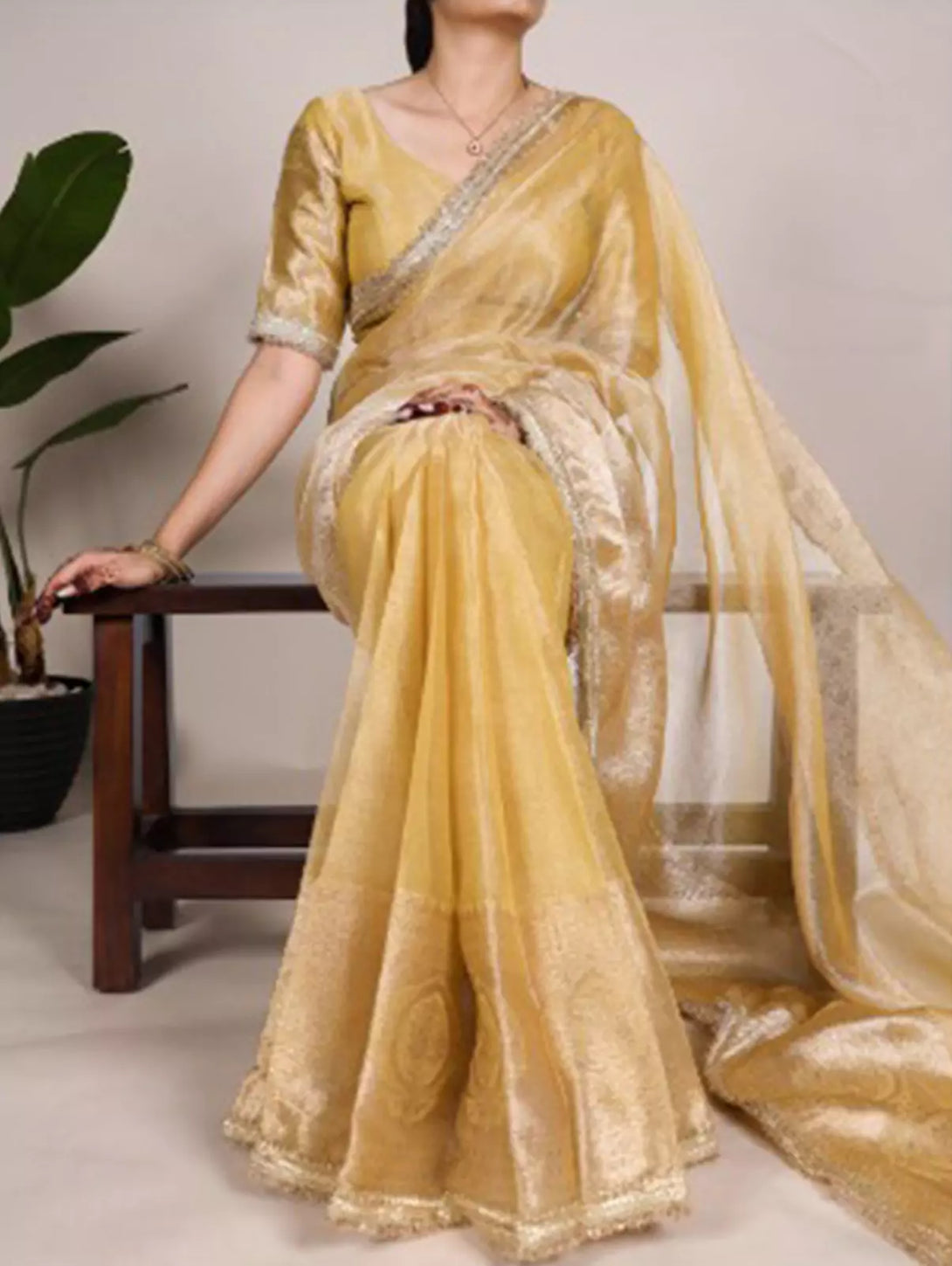 Yellow Shimmer Tissue Saree with Zari and Sequin border work
