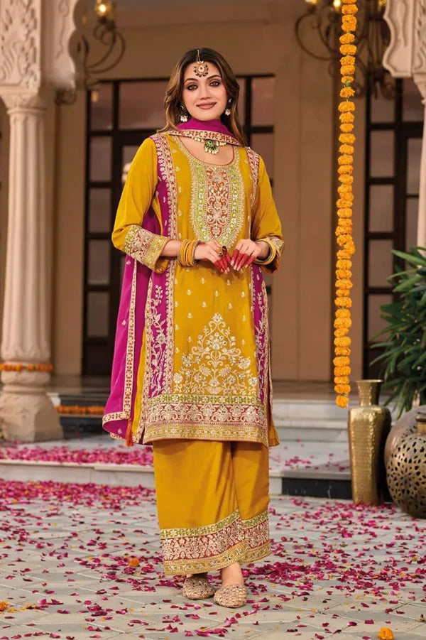 Yellow Silk Salwar Kameez with Embroidery and Ornate Patterns
