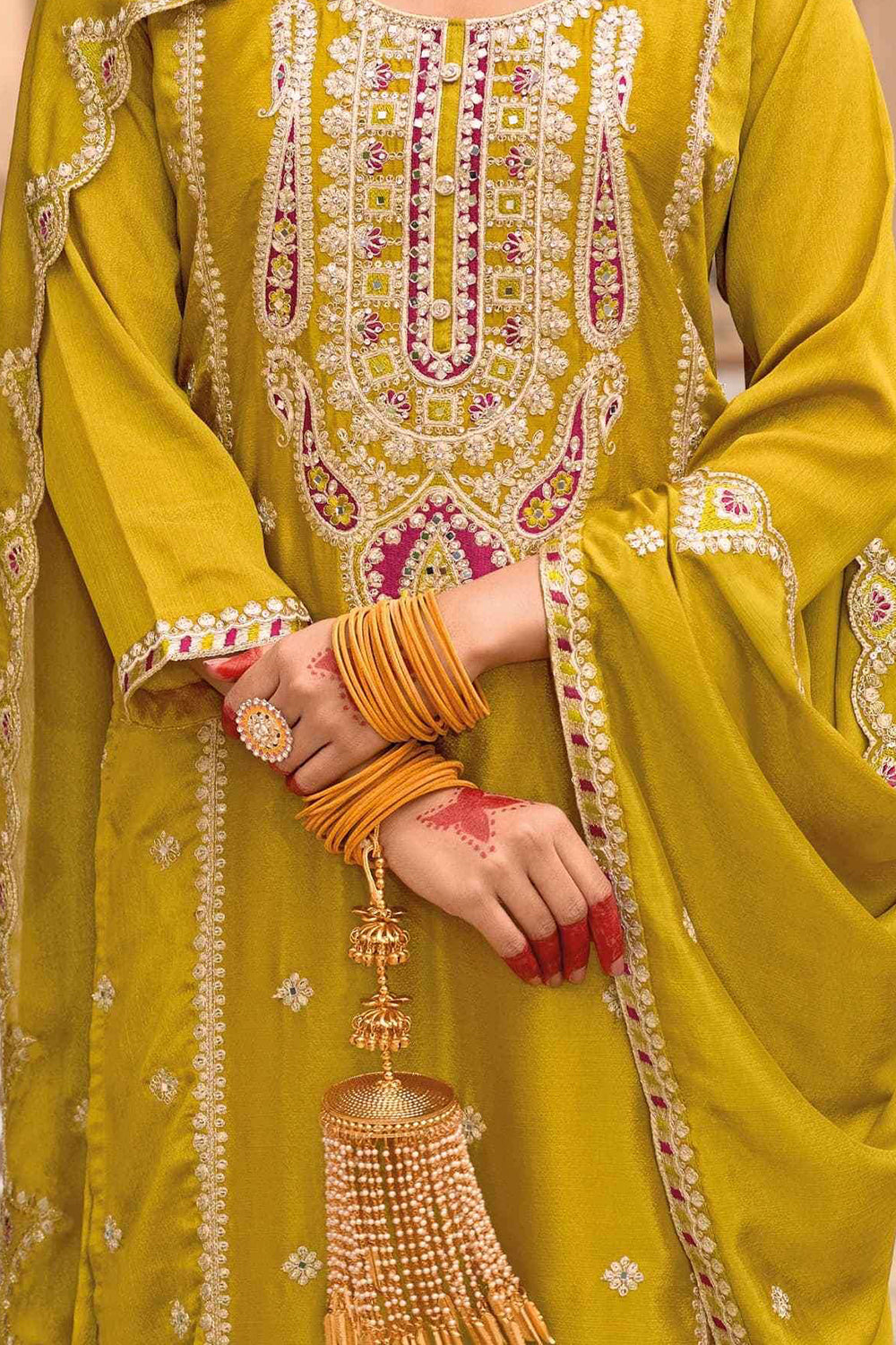 Yellow Silk Salwar Kameez with Zari Embroidery and Thread Work

