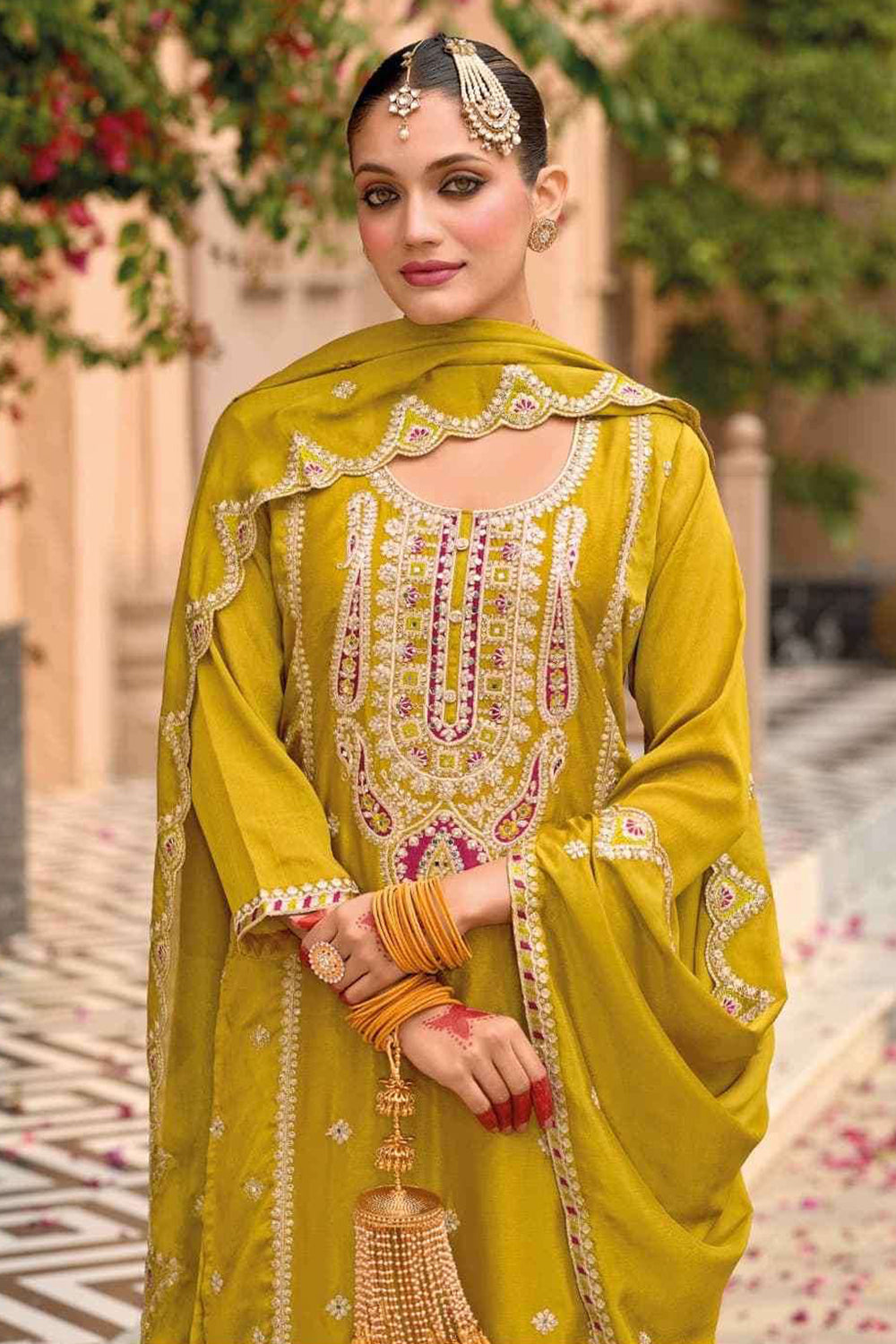 Yellow Silk Salwar Kameez with Zari Embroidery and Thread Work
