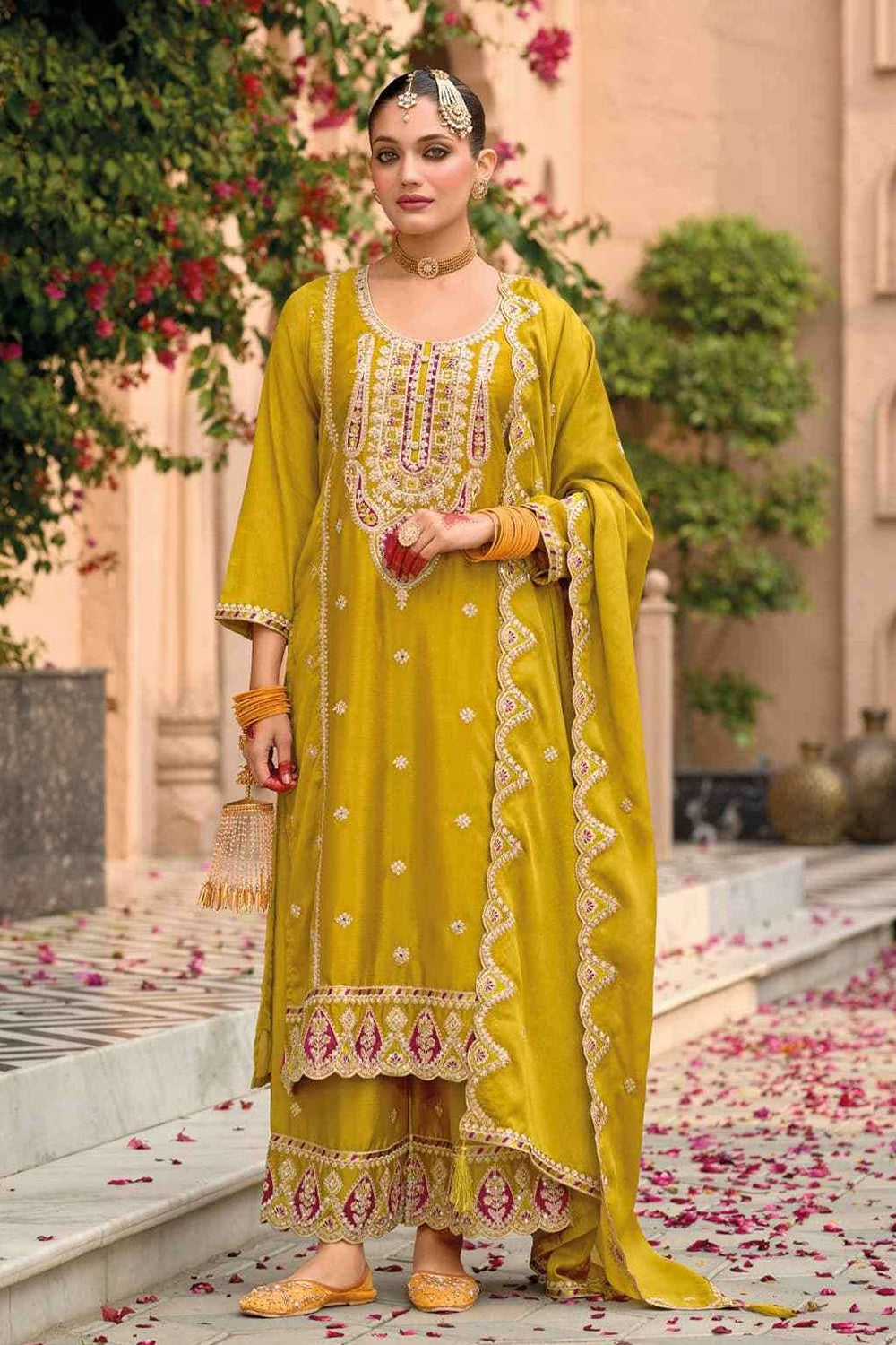 Yellow Silk Salwar Kameez with Zari Embroidery and Thread Work
