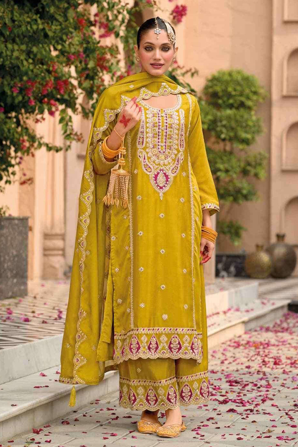 Yellow Silk Salwar Kameez with Zari Embroidery and Thread Work
