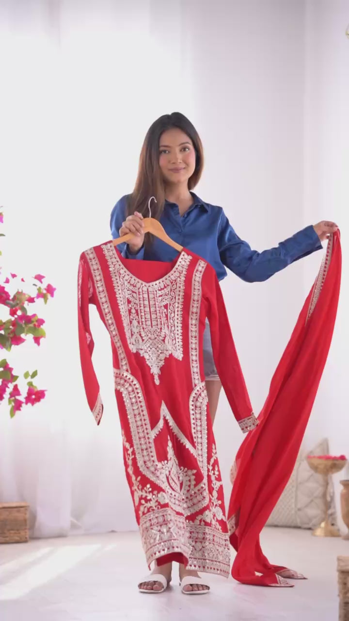 Red Silk Salwar Kameez with Intricate Embroidery and Thread Work